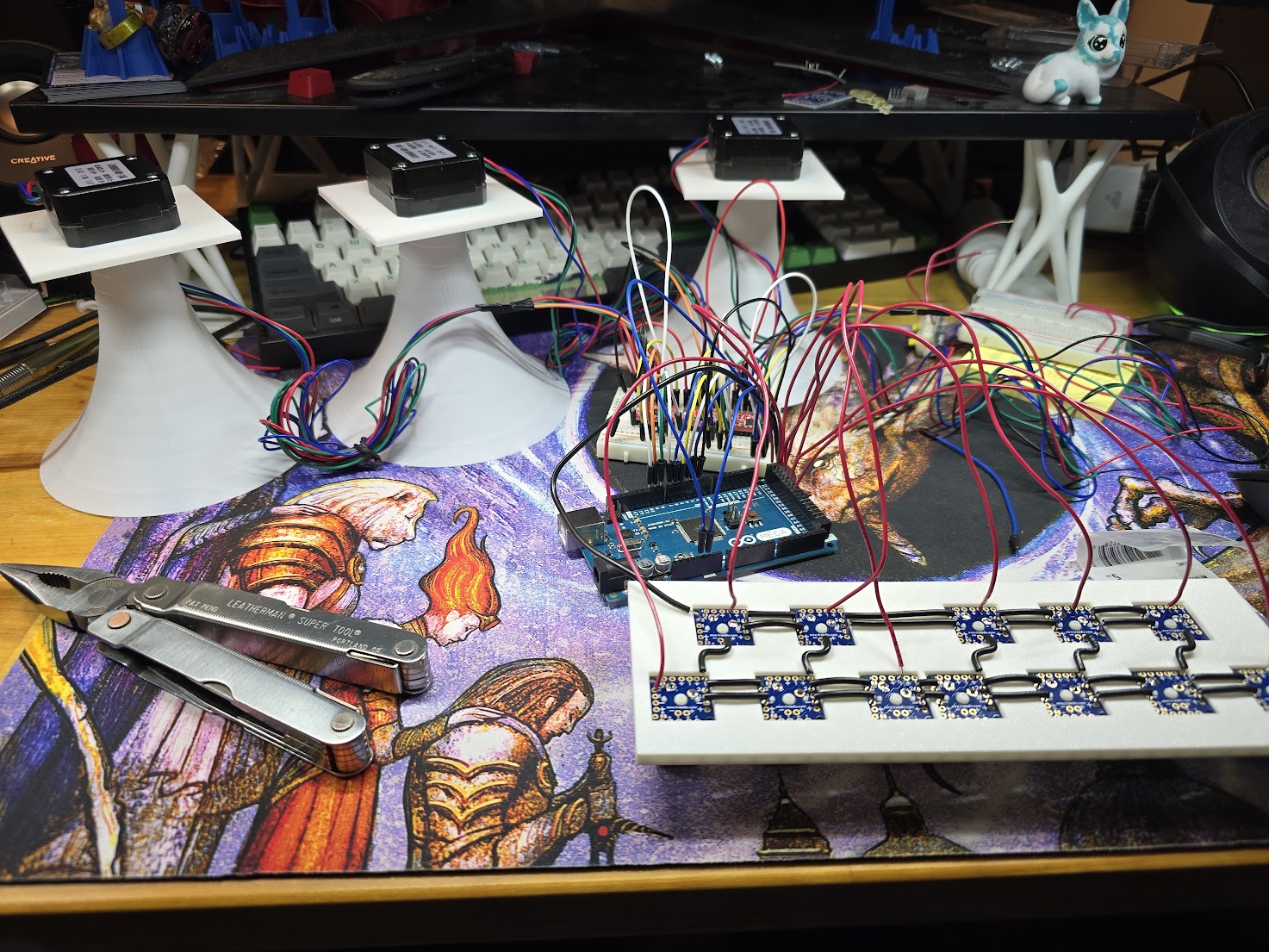 FPGA board, Arduino, stepper driver, and motor wired together