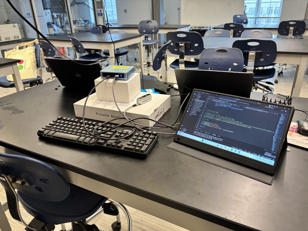 The PC and monitor used for the H.O.M.E. device, with external mouse and keyboard connected.