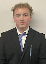 zoomed in shot of andrew in a suit