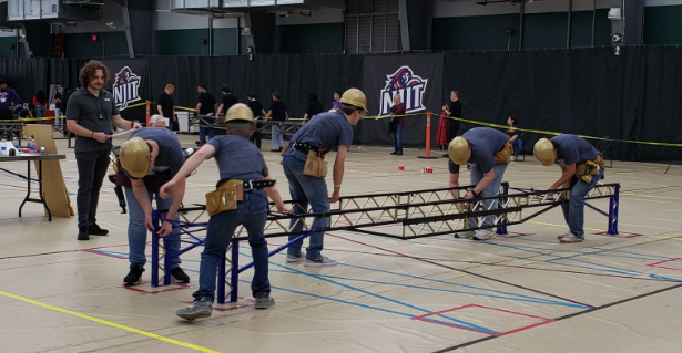 Team constructing the bridge at the regional competition